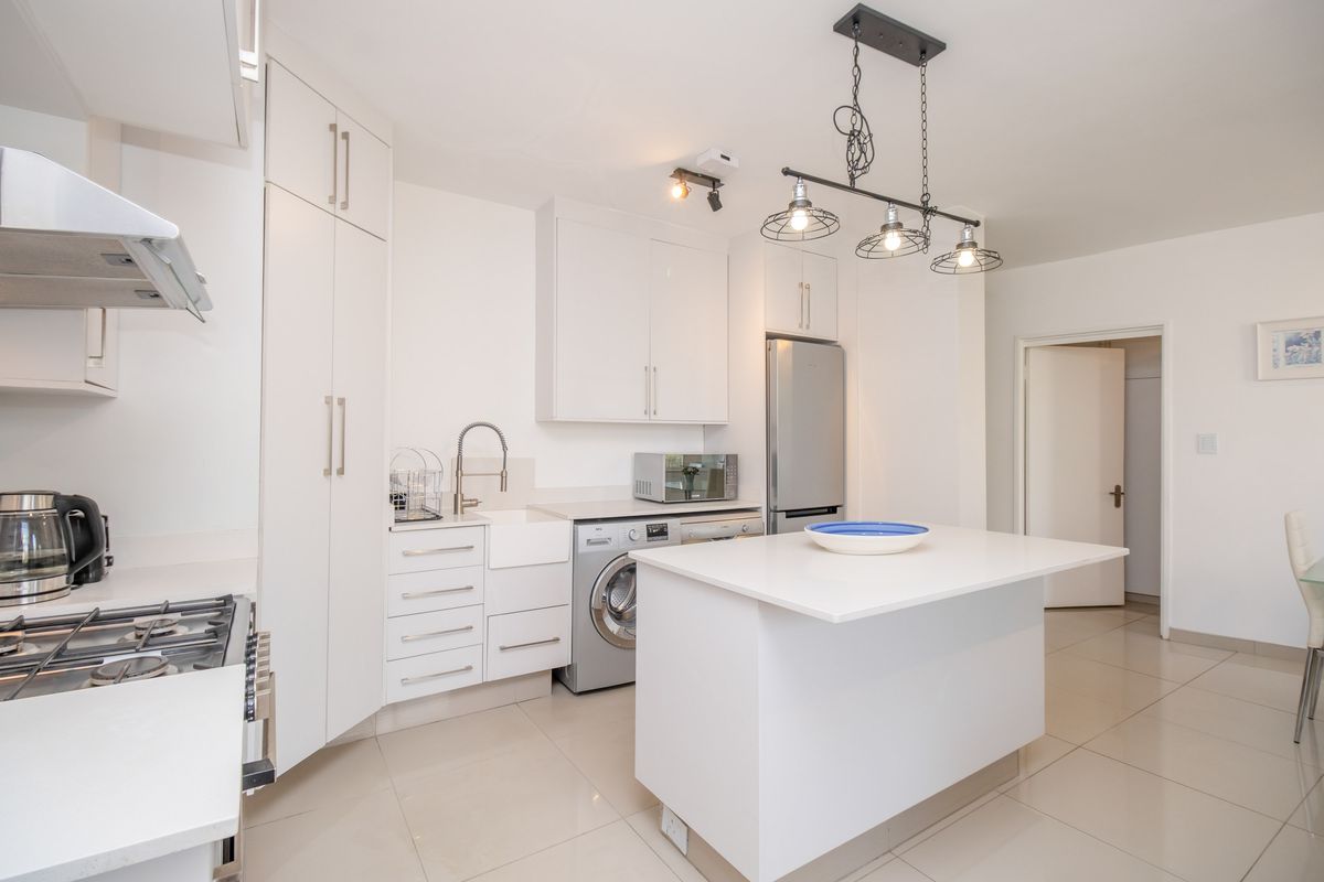 Elegant Fully Furnished 2 Bedroom Apartment on the 6th Floor – Prime Sandton Location - Photo 2