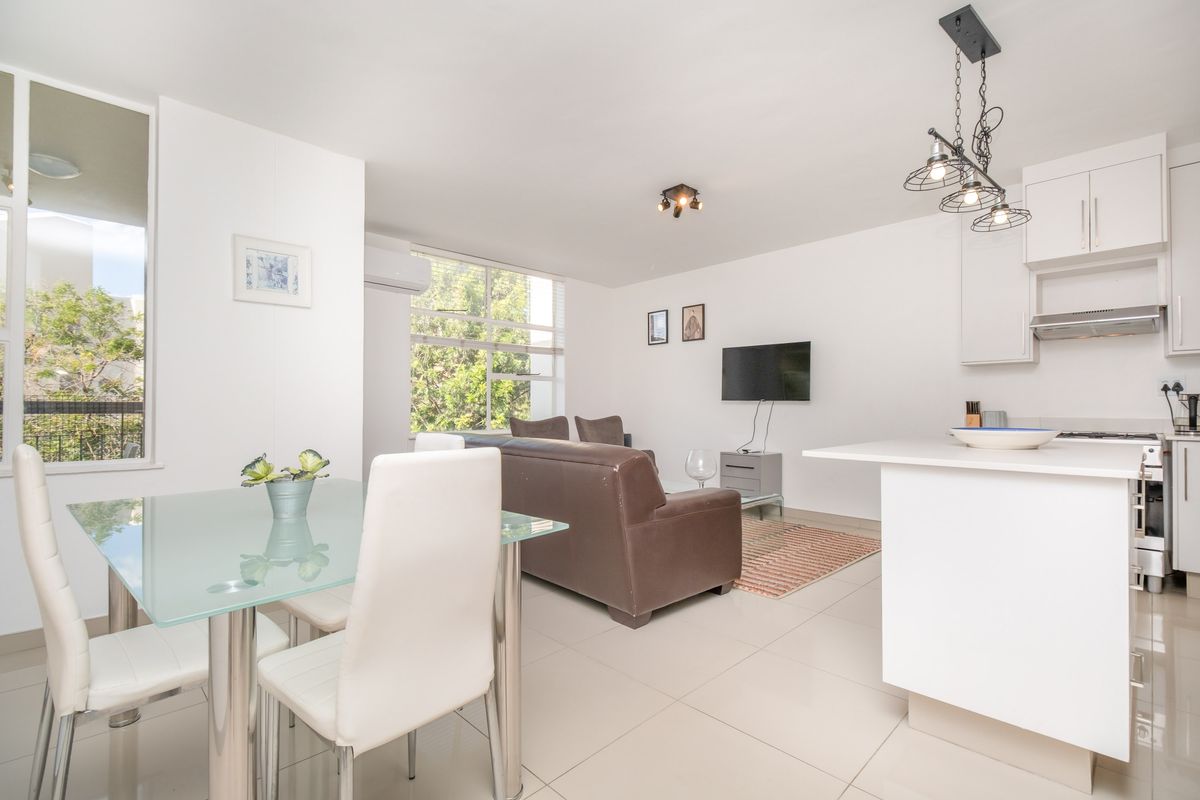 Elegant Fully Furnished 2 Bedroom Apartment on the 6th Floor – Prime Sandton Location - Photo 4