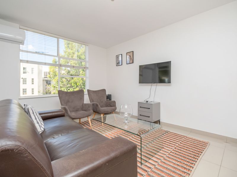 Elegant Fully Furnished 2 Bedroom Apartment on the 6th Floor – Prime Sandton Location - Photo 10