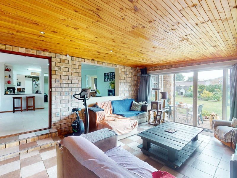 Charming 2-Bedroom Home With Spacious Living Areas & Drive-Through Garage - Photo 3