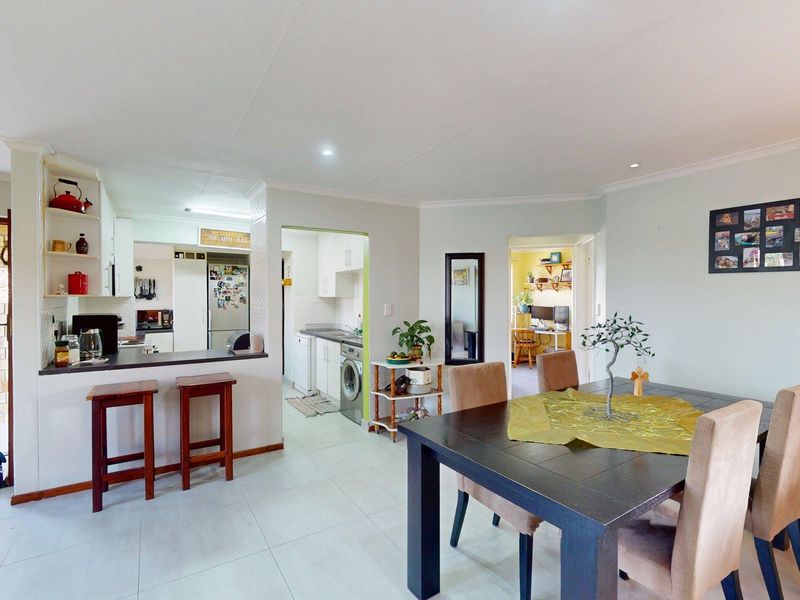 Charming 2-Bedroom Home With Spacious Living Areas & Drive-Through Garage - Photo 8