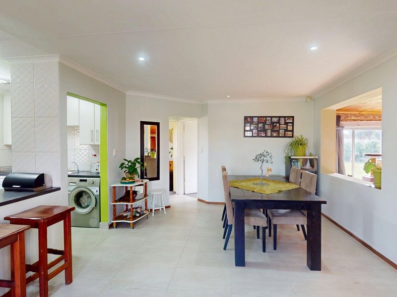 Charming 2-Bedroom Home With Spacious Living Areas & Drive-Through Garage - Photo 9