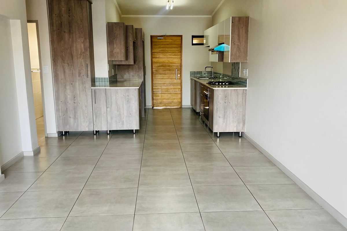 Modern 3-Bedroom, 2-Bathroom Apartment | Second Floor | Secure Estate Living - Photo 5