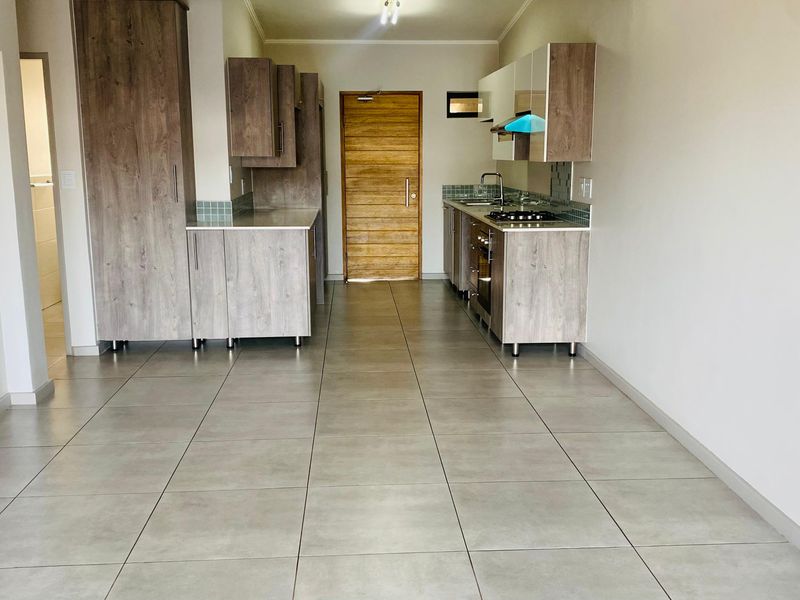 Modern 3-Bedroom, 2-Bathroom Apartment | Second Floor | Secure Estate Living - Photo 5