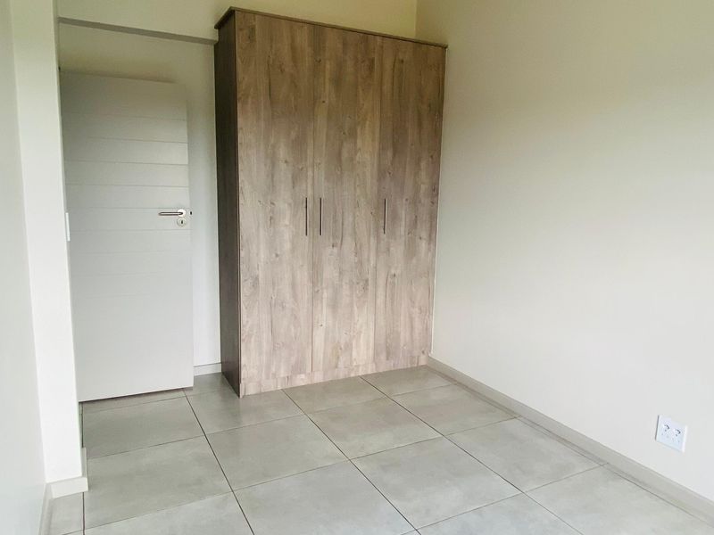 Modern 3-Bedroom, 2-Bathroom Apartment | Second Floor | Secure Estate Living - Photo 10