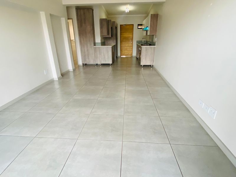 Modern 3-Bedroom, 2-Bathroom Apartment | Second Floor | Secure Estate Living - Photo 6