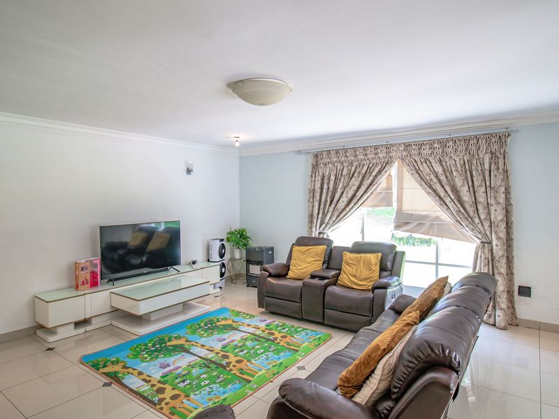 Versatile Family Living with Flatlet and Pool in Prime Location - Photo 7