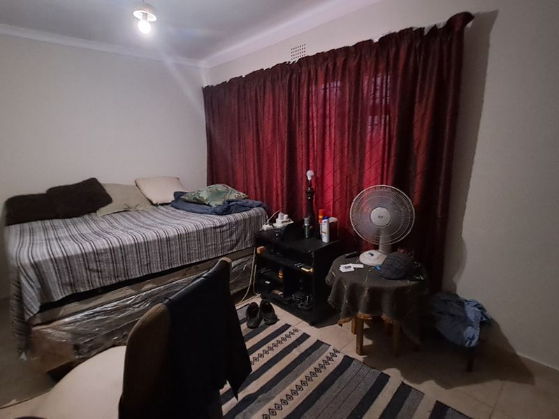 Spacious Family Home with Ample Parking for All Your Needs - Photo 8