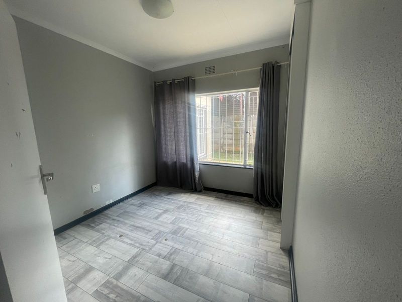 Spacious 4-Bedroom Home Offering Space and Functionality - Photo 9