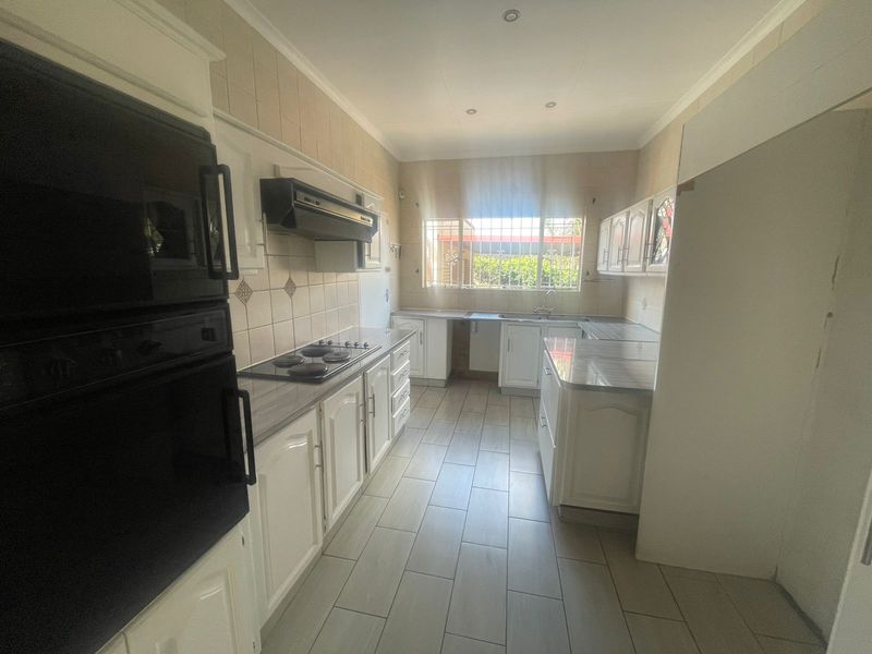 Spacious 4-Bedroom Home Offering Space and Functionality - Photo 7