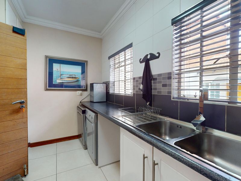 Exceptional 4-Bedroom Family Home with Solar, Borehole and Income-Generating Flatlets - Photo 7