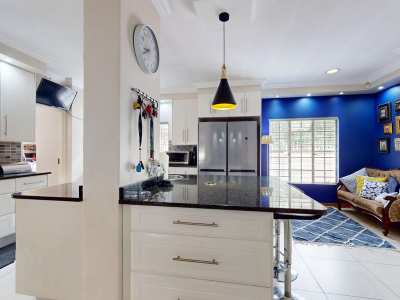 Exceptional 4-Bedroom Family Home with Solar, Borehole and Income-Generating Flatlets - Photo 6