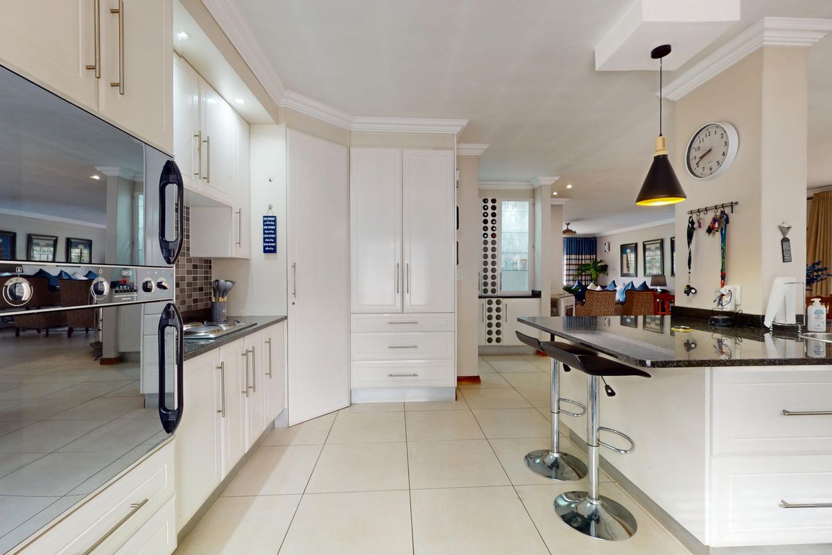 Exceptional 4-Bedroom Family Home with Solar, Borehole and Income-Generating Flatlets - Photo 4