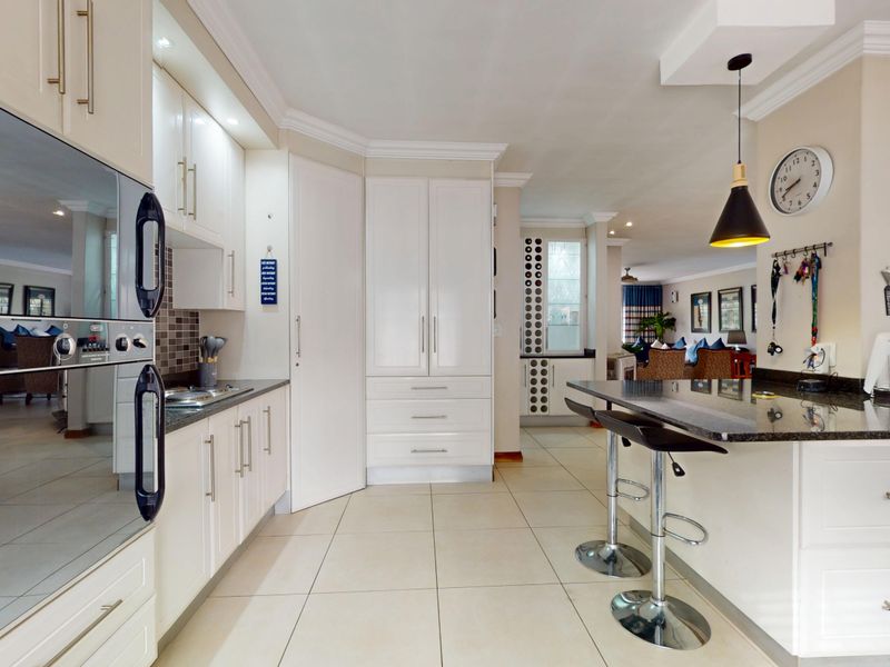 Exceptional 4-Bedroom Family Home with Solar, Borehole and Income-Generating Flatlets - Photo 4