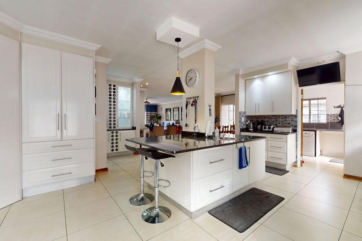 Exceptional 4-Bedroom Family Home with Solar, Borehole and Income-Generating Flatlets - Photo 3