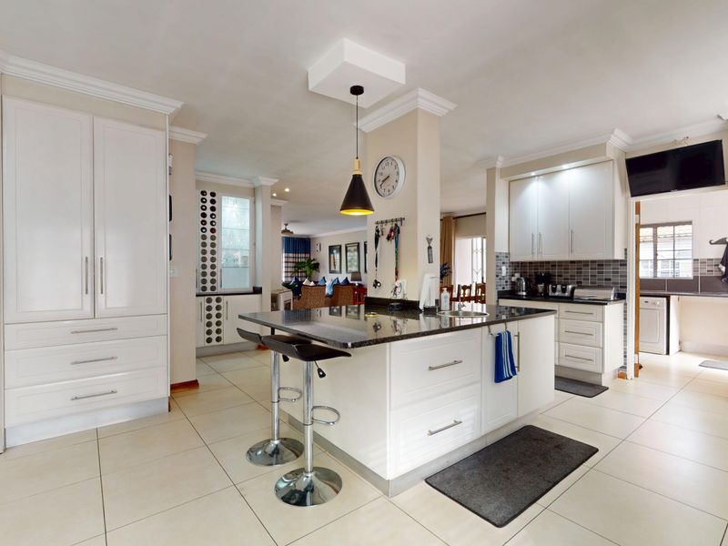 Exceptional 4-Bedroom Family Home with Solar, Borehole and Income-Generating Flatlets - Photo 3