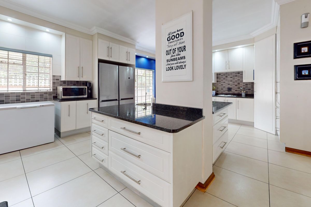 Exceptional 4-Bedroom Family Home with Solar, Borehole and Income-Generating Flatlets - Photo 5