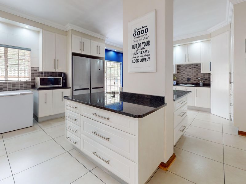 Exceptional 4-Bedroom Family Home with Solar, Borehole and Income-Generating Flatlets - Photo 5