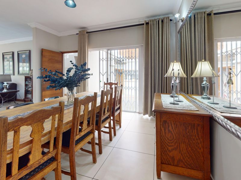 Exceptional 4-Bedroom Family Home with Solar, Borehole and Income-Generating Flatlets - Photo 9