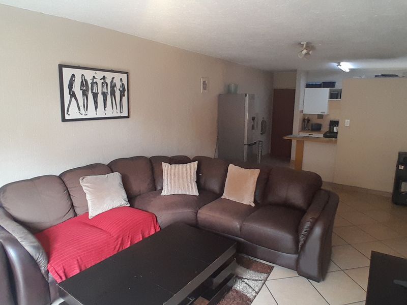 Neat Ground Floor Unit Comfort Meets Convenience - Photo 3