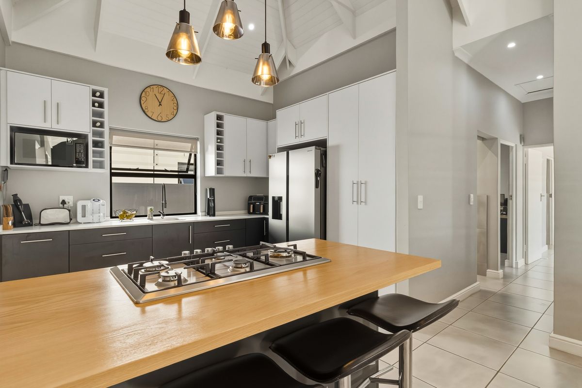 Modern Family Living with Solar in Secure Estate | Move-In Ready - Photo 5