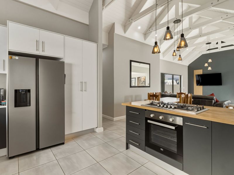 Modern Family Living with Solar in Secure Estate | Move-In Ready - Photo 2