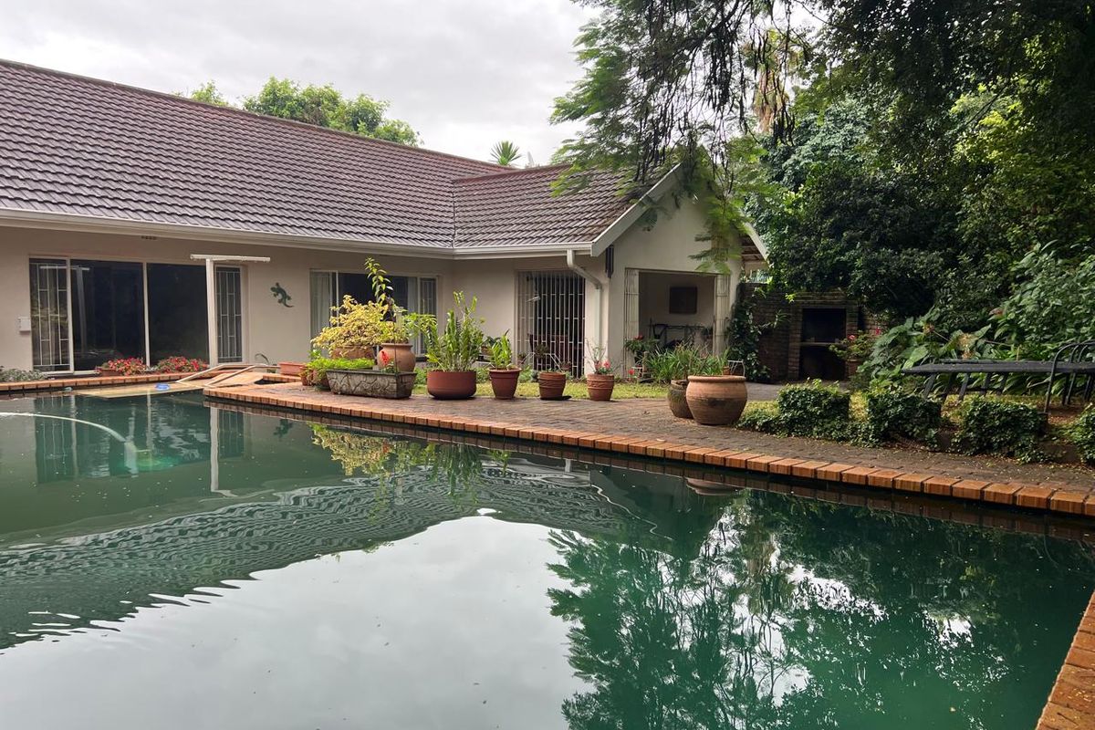 The Perfect Family Lifestyle Home in West Acres! - Photo 2