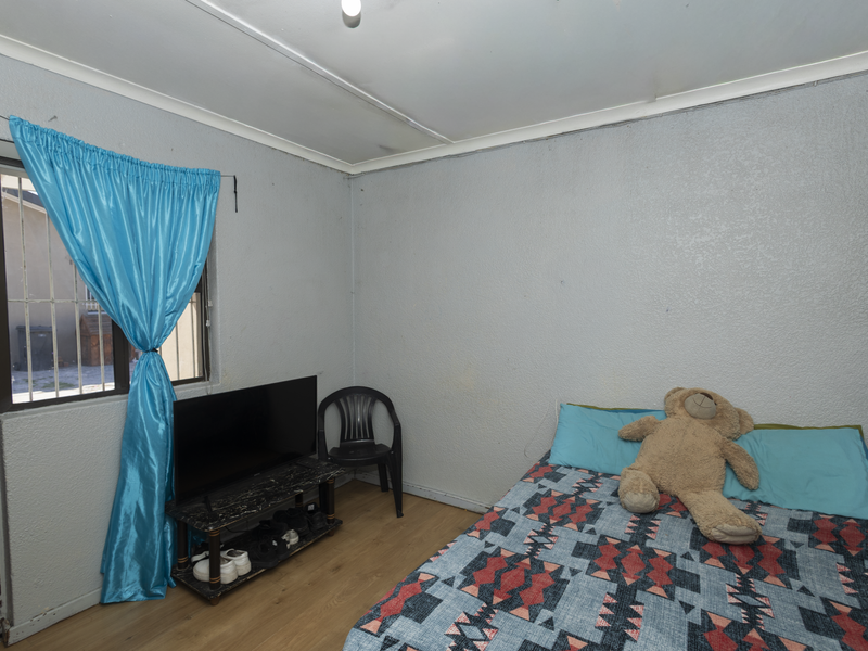 Spacious 4 Bedroom Family Home with Granny Flat & Large Yard - Photo 8