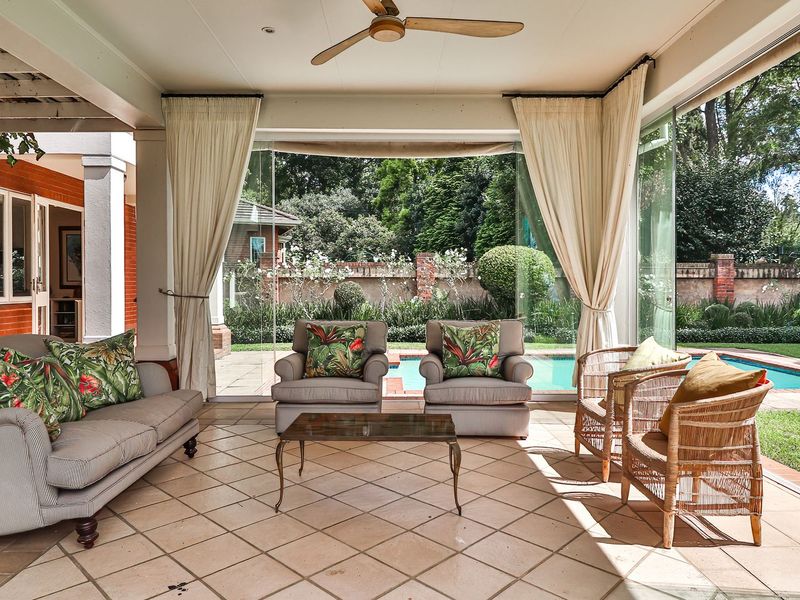 Timeless Elegance | 5-Bed Family Home with Regal Entertainment & Pool in Gated Estate - Photo 4
