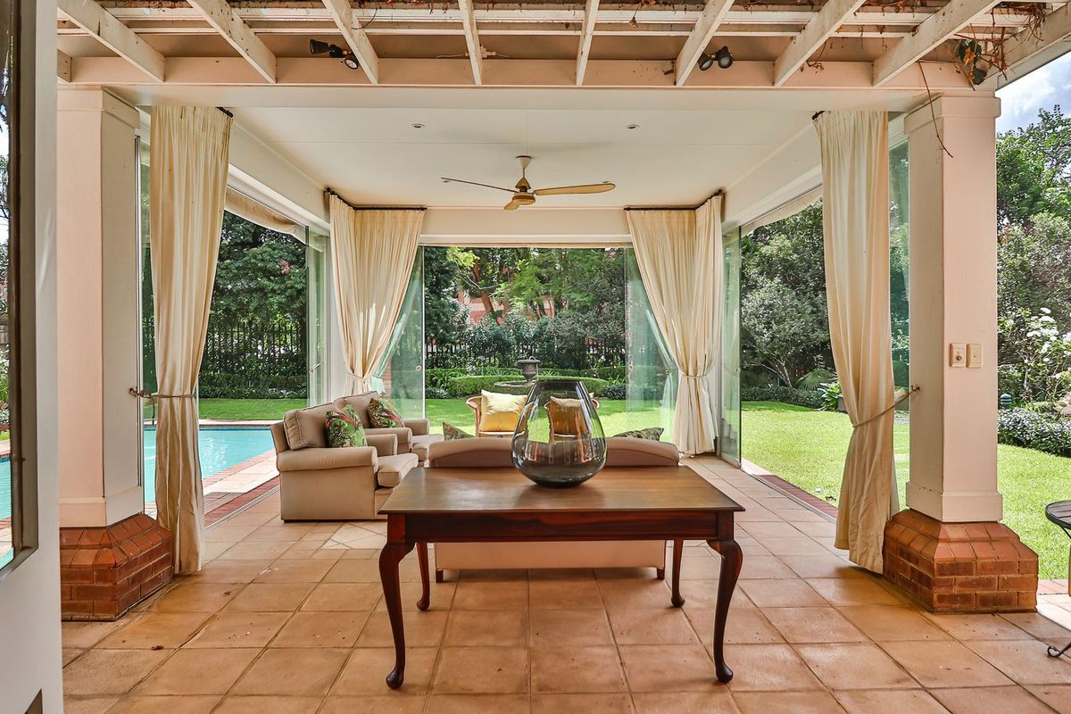 Timeless Elegance | 5-Bed Family Home with Regal Entertainment & Pool in Gated Estate - Photo 5