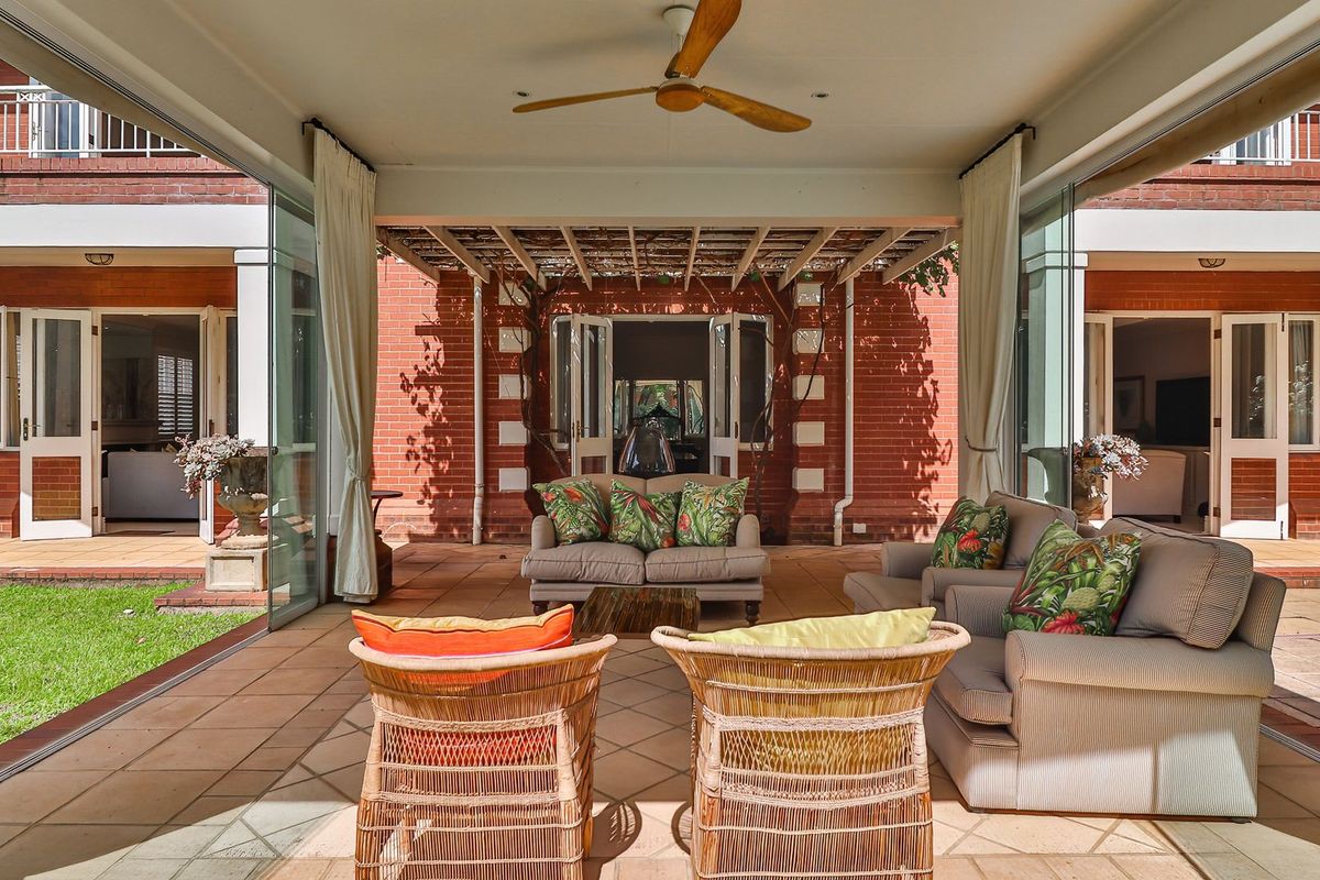 Timeless Elegance | 5-Bed Family Home with Regal Entertainment & Pool in Gated Estate - Photo 3