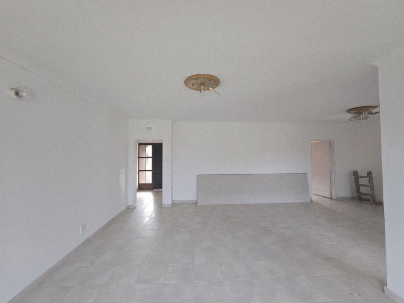 Spacious 3-Bedroom Home with Flat, Outside Room & Large Yard in Duhva Ext 1 - Photo 9