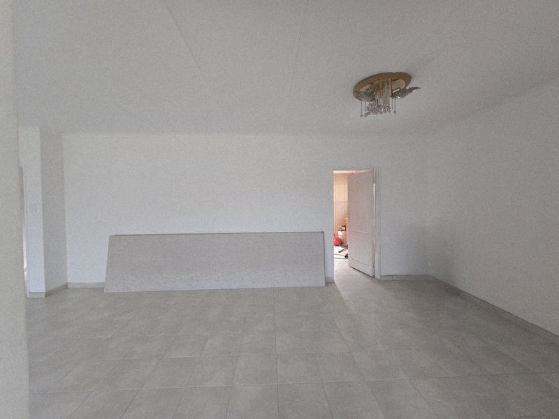 Spacious 3-Bedroom Home with Flat, Outside Room & Large Yard in Duhva Ext 1 - Photo 8