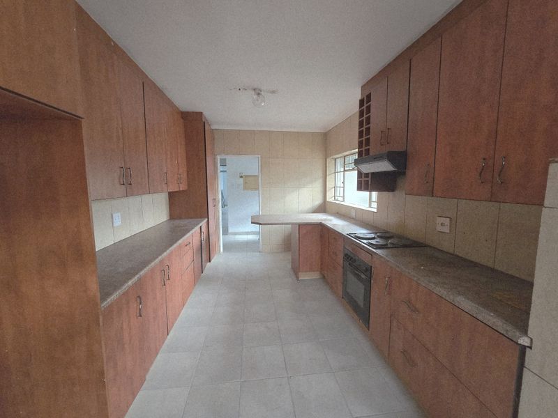 Spacious 3-Bedroom Home with Flat, Outside Room & Large Yard in Duhva Ext 1 - Photo 6