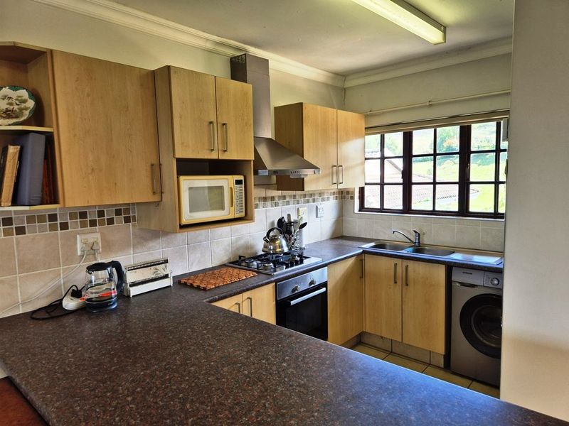 Neat & Accessible 2-Bedroom Apartment with Midmar Views - Photo 8