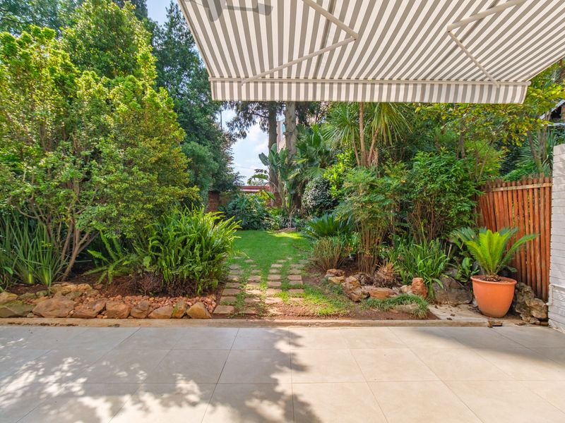 Spacious Renovated 2-Bedroom Apartment in Prime Sandton Location – North-Facing with Garden & Patio - Photo 8