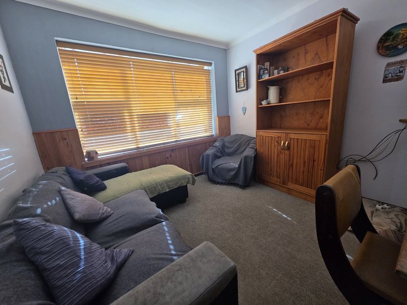 Charming Wheelchair-Friendly Corner Home with Loft Space & Business Potential - Photo 9