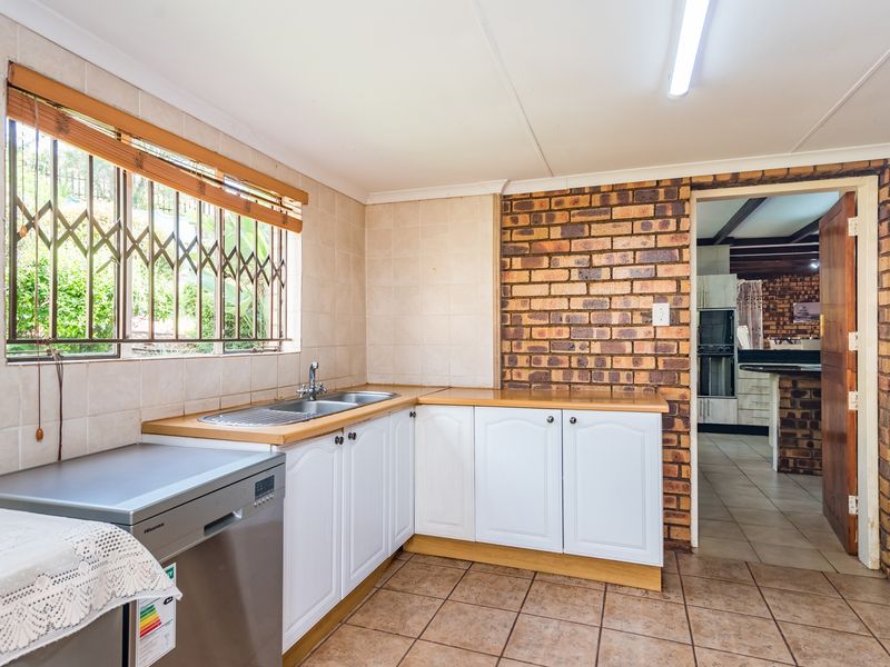 Elegant Family Home with Pool & Garden Oasis - Photo 7