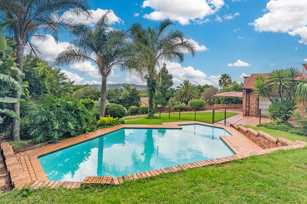 Elegant Family Home with Pool & Garden Oasis - Photo 2