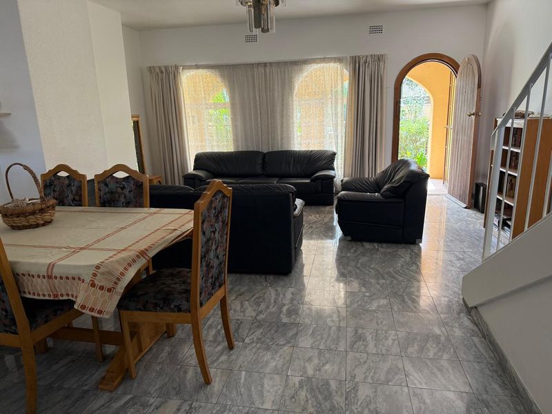 Neat & Secure 2-Bedroom Duplex with Lock-Up Garage - Photo 2