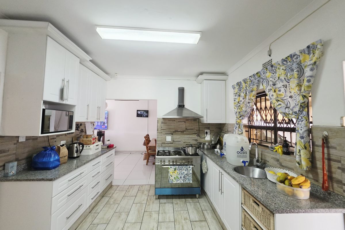 Stunning Face Brick Home with Modern Comforts and Added Value - Photo 2