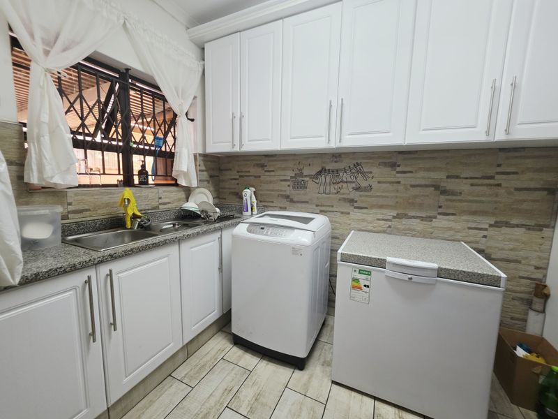 Stunning Face Brick Home with Modern Comforts and Added Value - Photo 6