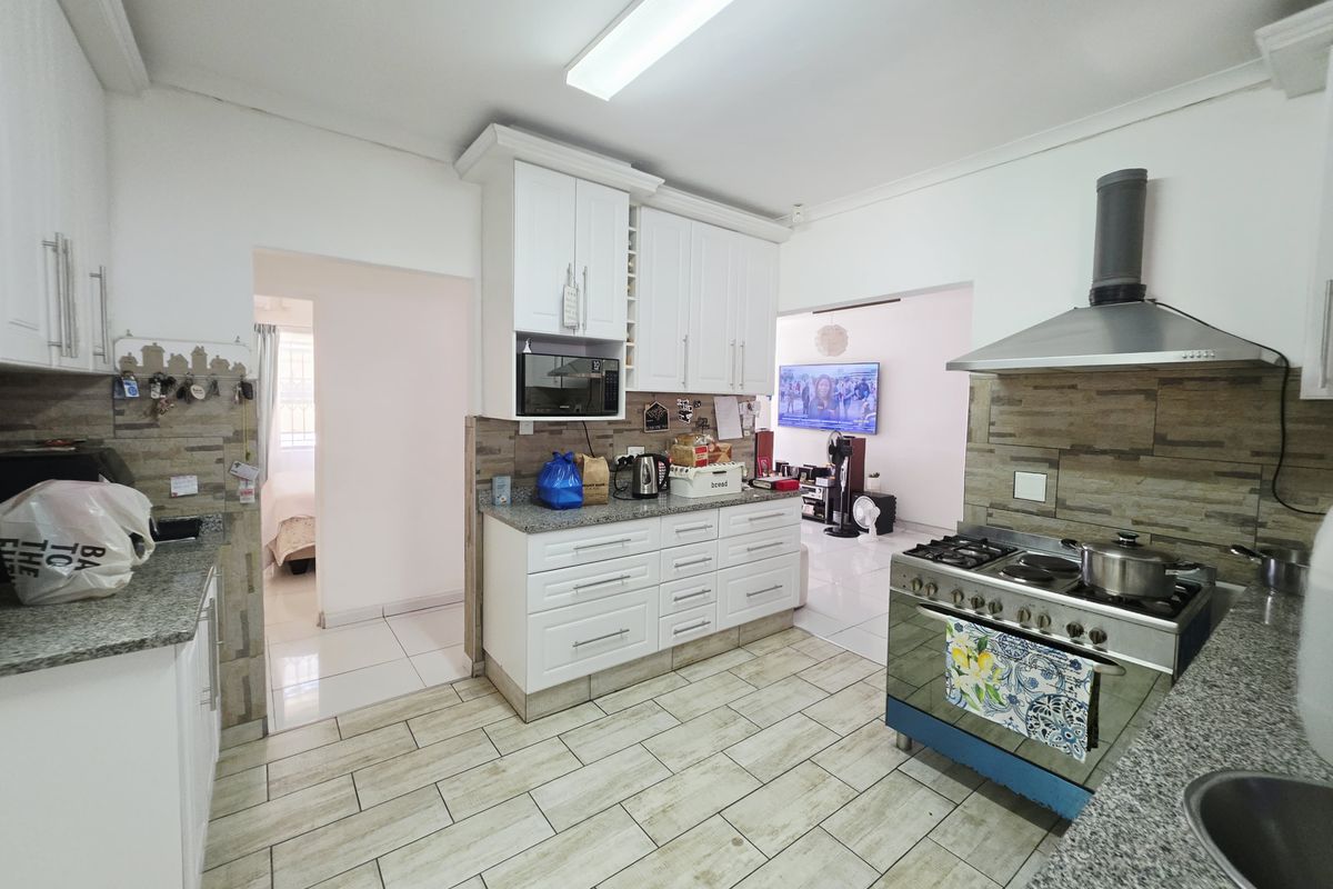 Stunning Face Brick Home with Modern Comforts and Added Value - Photo 4