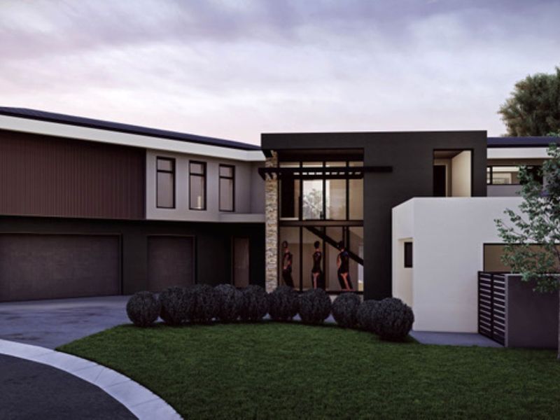 Modern architectural exterior featuring a double garage, stone cladding accents, and large glass windows, showcasing a contemporary design aesthetic.