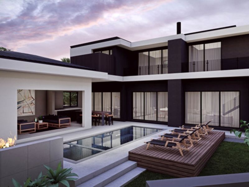 Modern architectural rear elevation featuring a swimming pool, timber decking, and a covered patio area with integrated outdoor living space.