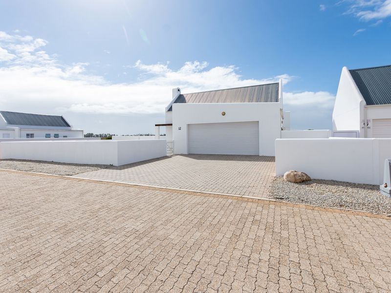 Charming 3-Bed Family Home — Move-In Ready with Under-Roof Braai & Double Garage - Photo 8