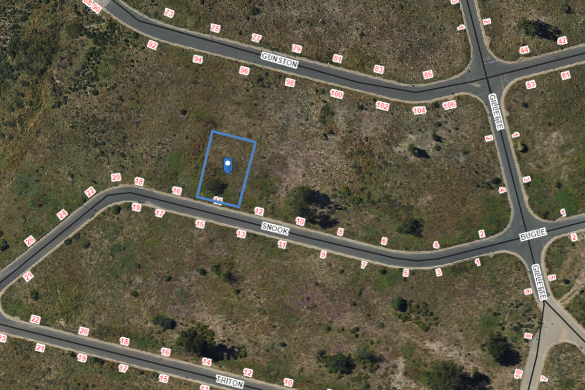 Aerial view of a vacant residential plot located on Snook street, showing the property boundaries and surrounding neighborhood layout.