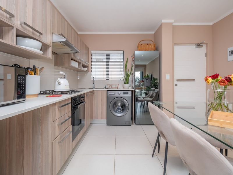 Ground-floor ease. Private garden living. Effortless convenience. - Photo 4
