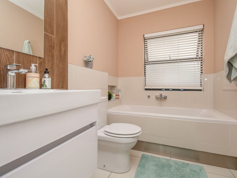 Ground-floor ease. Private garden living. Effortless convenience. - Photo 10