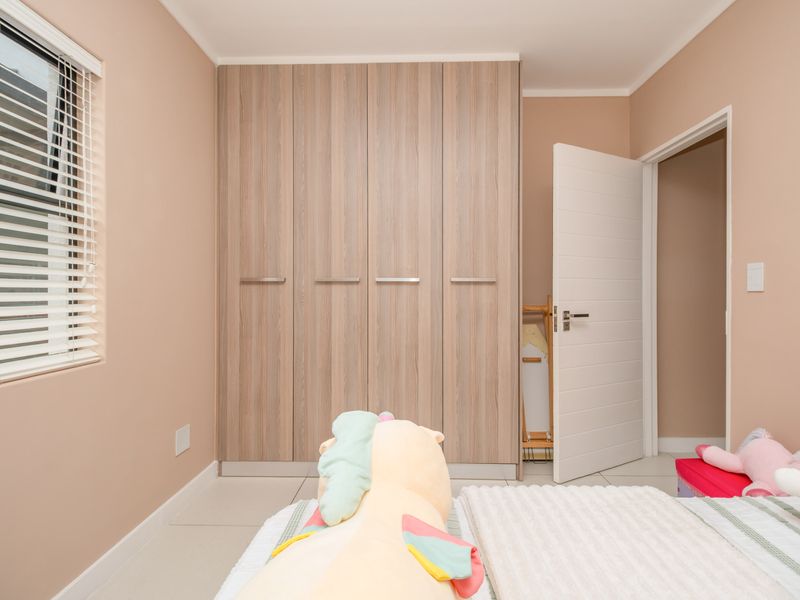 Ground-floor ease. Private garden living. Effortless convenience. - Photo 9